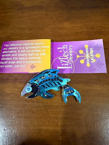 Liztech running salmon pin