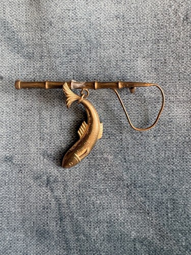 Vintage fishing rod and - and, fish